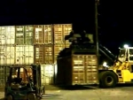 'Stacking of Containers at Night' Cayman Islands Port Authority
